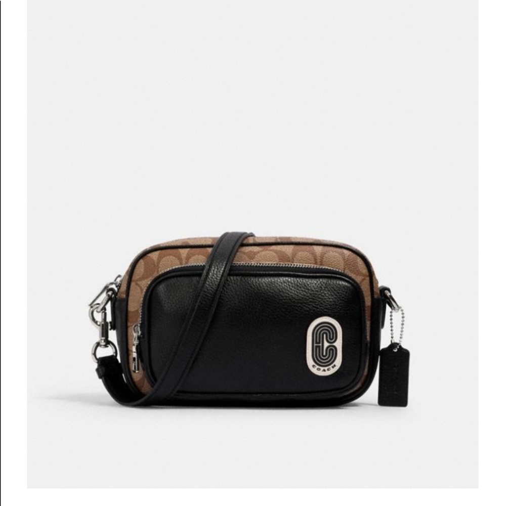 COPY - NWT Coach court crossbody in signature canvas